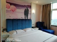 罗尔曼酒店(苍南河滨东路店) - 豪华大床房
