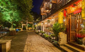The sentence provided is incomplete and lacks a clear subject and verb at Zhouzhuang Latte Play Stone Mulan Hotel