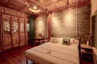 Lijiang Yixing Huaxi Inn - إقامة ريفية