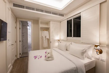 Siam Tharadol Отели рядом с достопримечательностью «Wat Thung Setthi»