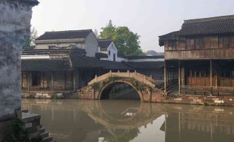 wuzhenshuimunianhuahotel - Housity
