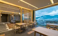 Tengchong Boyun Hot Spring Inn - فطور