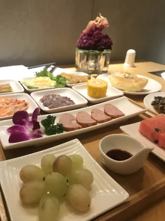 Jiuyi Mansion Отели в г. Баоцин