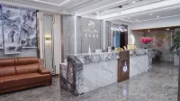 Xiuwen Aishang Hotel فنادق في شيو ون