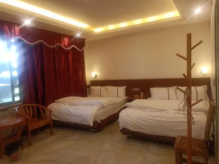 Longnan Hakka Business Hotel Отели рядом с достопримечательностью «Guanxi Xinwei Scenic Area»