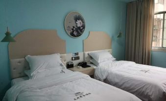 Baojing Wenfeng Business Hotel