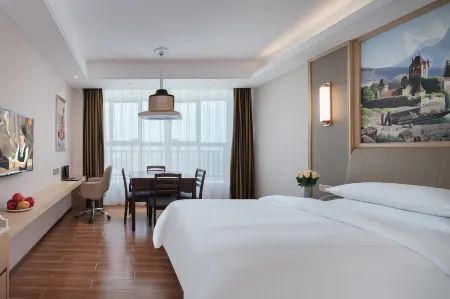 Vienna International Hotel (Dushan) Отели в г. Душань