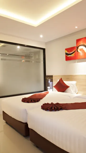 ห้องดีลักซ์ เตียงเดี่ยว 2 เตียงพร้อมระเบียง