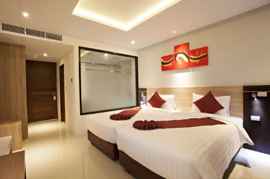 ห้องดีลักซ์ เตียงเดี่ยว 2 เตียงพร้อมระเบียง