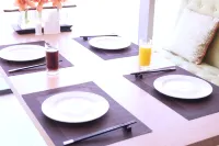 Sweetome Vacation Residence (Qingdao Railway Station Zhanqiao) - servizio colazione