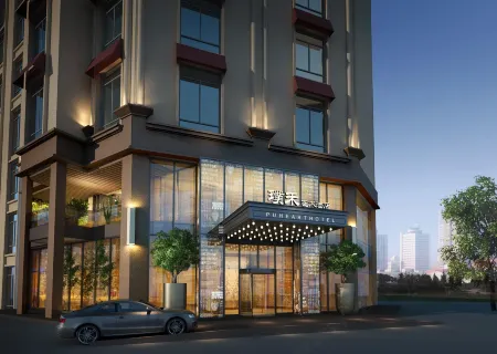 Puheart Hotel (Bozhou Wanda Plaza) Отели рядом с достопримечательностью «Huazu Temple»