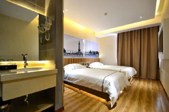 Henghe Chuntian Holiday Hotel Отели рядом с достопримечательностью «Zhou Enlai Forepart Harbin Develop Revolution Activity Domicile Relic Site»