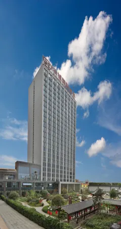 Huacheng International Hotel Отели в г. Лечан