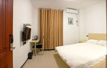 Xiuning Le Mei Hotel Отели рядом с достопримечательностью «Huangshan Panda Ecological Paradise»