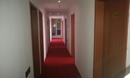 Huixin Business Hotel - Housity