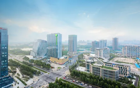 Holiday Inn Express Zhengzhou ast Railway Station Longzi Lake Отели рядом с достопримечательностью «Henan Agricultural University (Longzihu Campus)»