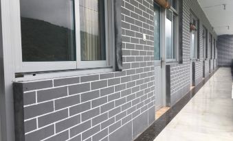 Huguan Jiujiayi Farm Inn