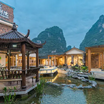 Shanshui Bieyuan Song Culture Vacation Apartment (Yangshuo Ten-Mile Gallery Yulong River) โรงแรมใกล้อูฐข้ามแม่น้ำ