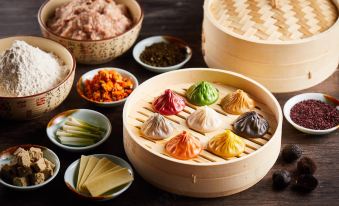 A variety of dumpling dishes are available on the table for easy preparation at Dorsett Mongkok Hong Kong