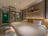 淘元漫居酒店(宁波高教园区店) - 清源双床房