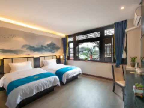 Qinqi Inn Hotels near Yunnan Nationalities Village