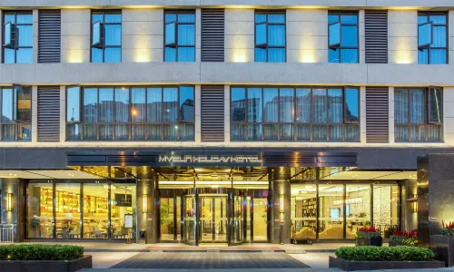 Shiyan Meisheng Holiday Hotel (Shanghai Road University Town)