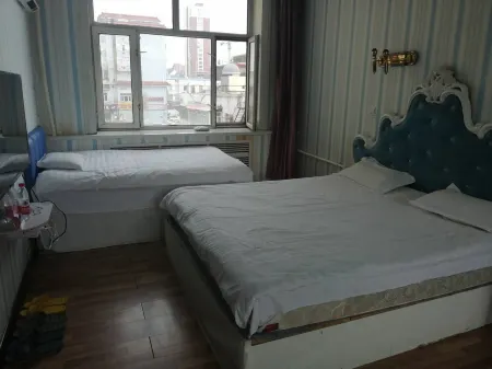 Da Hinggan Ling 520 Theme Hotel (Gagdaqi Railway Station) Отели рядом с достопримечательностью «Beishan Mountain Forest Park»