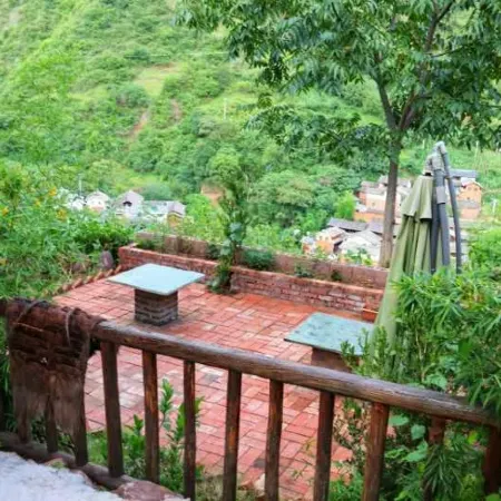 Guanjing Inn Nuodeng Ancient Village Отели в г. Юньлун