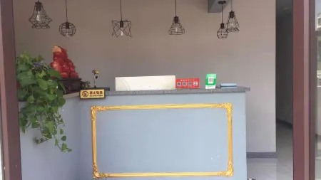 Tieling July Theme Hotel