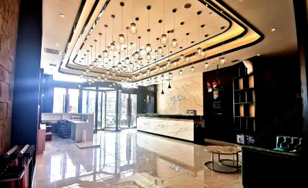Wanpeng Xiting Hotel Отели рядом с достопримечательностью «Huanghe Shequ Guojia Dizhi Park»