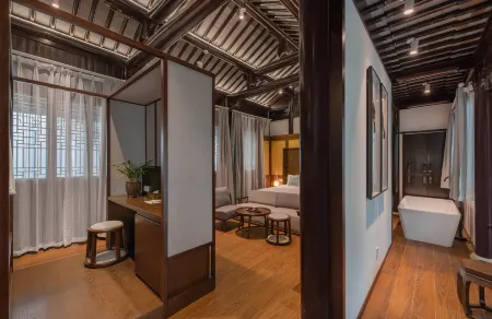 Gusu Yard Xuanzhou Отели рядом с достопримечательностью «Quyuan Garden»