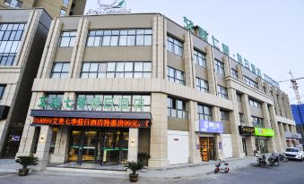 Aimei Qiji Holiday Hotel (Tengzhou Zhen'ai Shopping Mall)
