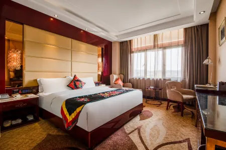 Jianhua International Hotel Отели рядом с достопримечательностью «Ancient Town of Yi People»