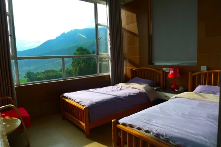 Yuanyang Green Hostel & Sunny Guesthouse Отели рядом с достопримечательностью «Duoyishu Terraced Field»