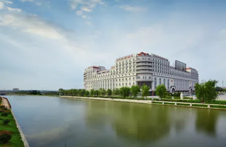 Kaiyuan Manju Select Hotel(Hongqiao Hub National Exhibition Center Store) Отели рядом с достопримечательностью «Dayuantong Temple»