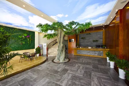 Faili Hot Spring Holiday Hotel Отели рядом с достопримечательностью «Gui'an Ocean World»