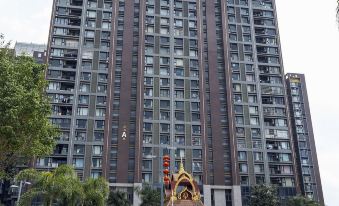 Muzijia Apartment (Xishuangbanna Jinghong Splashing Water Plaza)