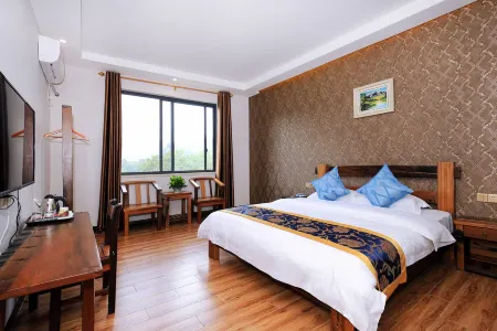 520 Boutique Homestay (Guilin University of Electronic Science and Technology Huajiang Campus) Отели рядом с достопримечательностью «Li River Craftsman Village»