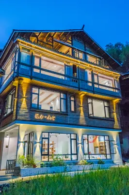 Zhaoxing Creedside Inn Отели в г. 