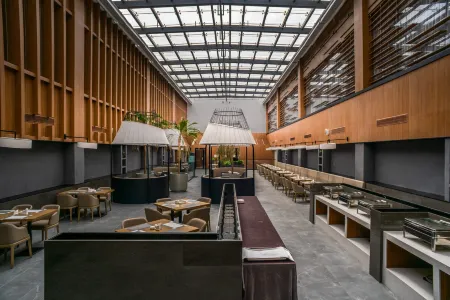 Ligang Hotel (Yuhuan Chumen Passenger Transport Center Commercial Exhibition Center Store) Отели в г. Юйхуань