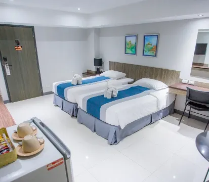 ห้องดีลักซ์ เตียงใหญ่ 1 เตียง