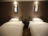 中牟椰枣园商务宾馆 - 高级双床房