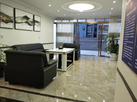 Fenggang Xinhe Apartment Отели рядом с достопримечательностью «Пейзажный район чайного моря»