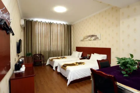 Bayun Hotel (Wuyuan Bus Station) Отели в г. Уюань