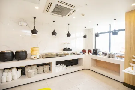 Qingmu Hotel (Nanjing Wutaishan Guangzhou Road Suiyuan Building) Отели рядом с достопримечательностью «Nanjing Normal University Suiyuan Campus Multiple-use Gymnasium»