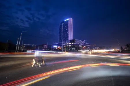 Damei International Hotel Отели рядом со станцией Junan Railway Station