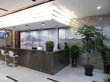 Shangpin Business Hotel Отели рядом с достопримечательностью «Taiji Wuse Valley»