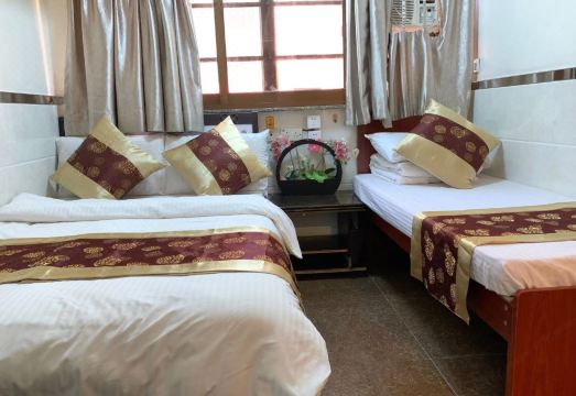 Qian Yue Inn의 깔끔한 객실 내부