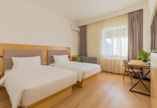 화이 컬렉션 호텔의 깨끗한 객실