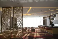 Shuangman Fuyuan International Hotel - bar
